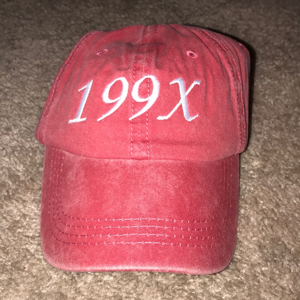 A Had from personal brand Xquisite Clothing.